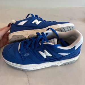 Blue Sneakers with White Accents and Athletic Design